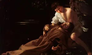 Anioł czuwa nad śpiącym świętym Franciszkiem. Caravaggio, mistrz światłocienia, ukazuje tu jeden ze swoich najsłynniejszych obrazów.