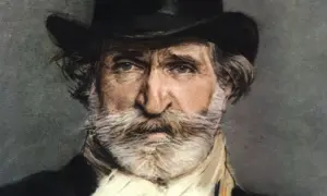 Portret mężczyzny z siwą brodą i wąsami, w cylindrze. To Giuseppe Verdi, słynny kompozytor.