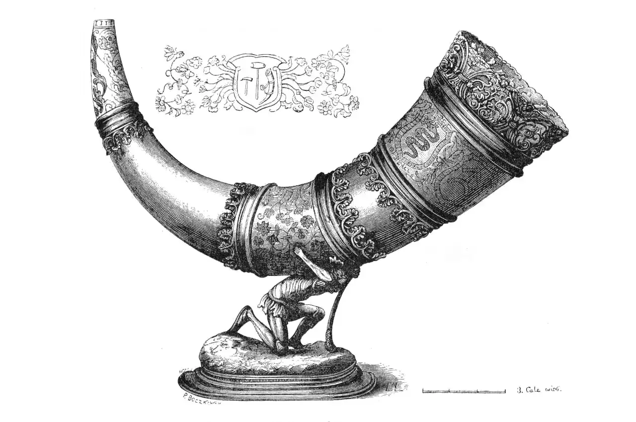 Ozdobny złoty róg, podtrzymywany przez klęczącego mężczyznę, symbolizuje bogactwo i tradycję, idealny na złoty róg wesele.