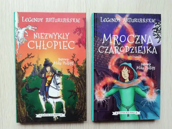 Dwie okładki książek z serii "Legendy Arturiańskie": "Niezwykły chłopiec" z rycerzem i smokami, oraz "Mroczna czarodziejka" z magią, nawiązujące do legend Camelotu.