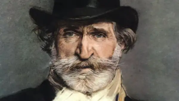 Portret mężczyzny z siwą brodą i wąsami, w cylindrze. To Giuseppe Verdi, słynny kompozytor.